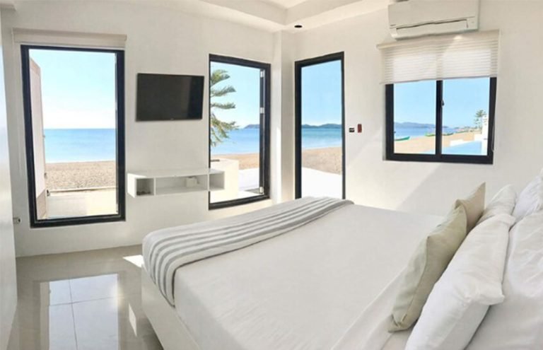 Seaview Deluxe Poolside room opening to the infinity pool
