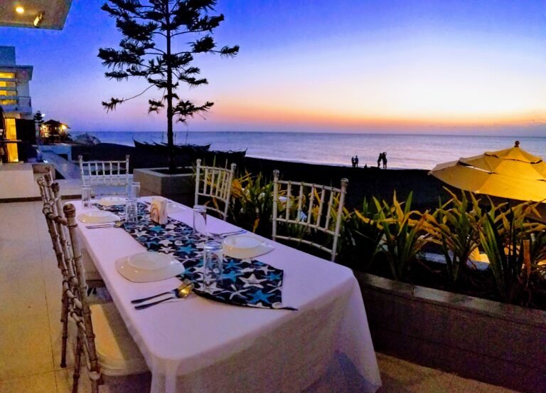 Dinner table by the sea at sunset